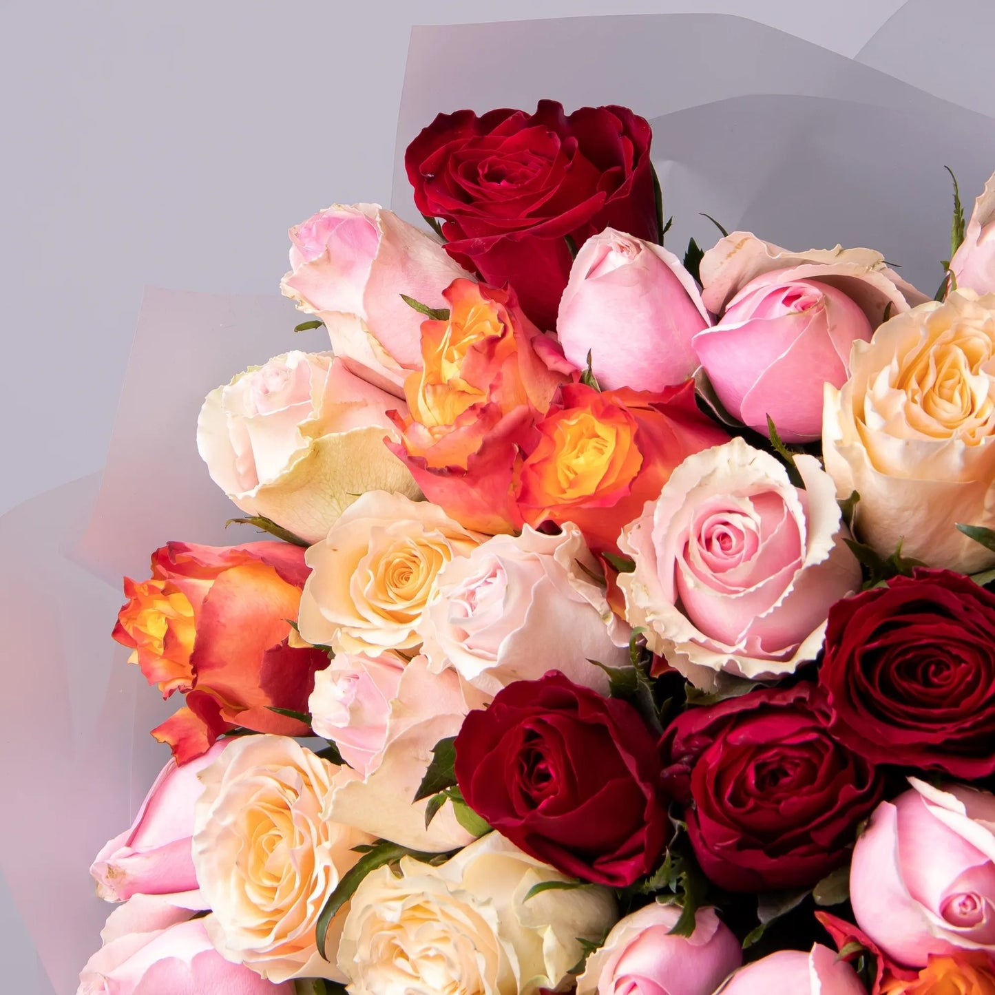 Close-up of multicolor roses in large bouquet