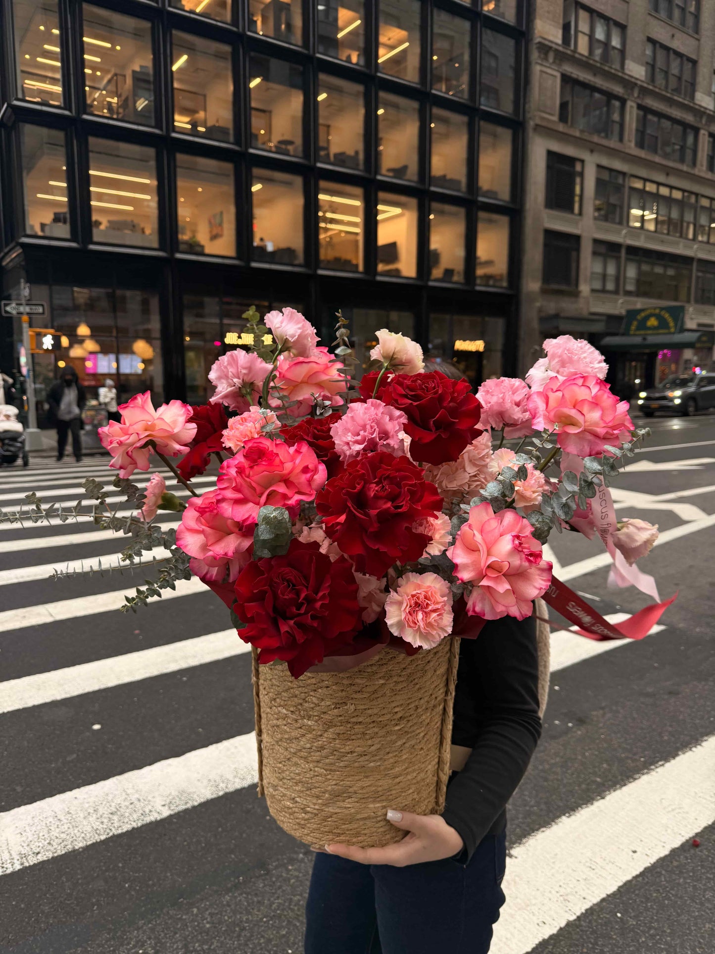 Fresh flower basket arrangement with assorted blooms