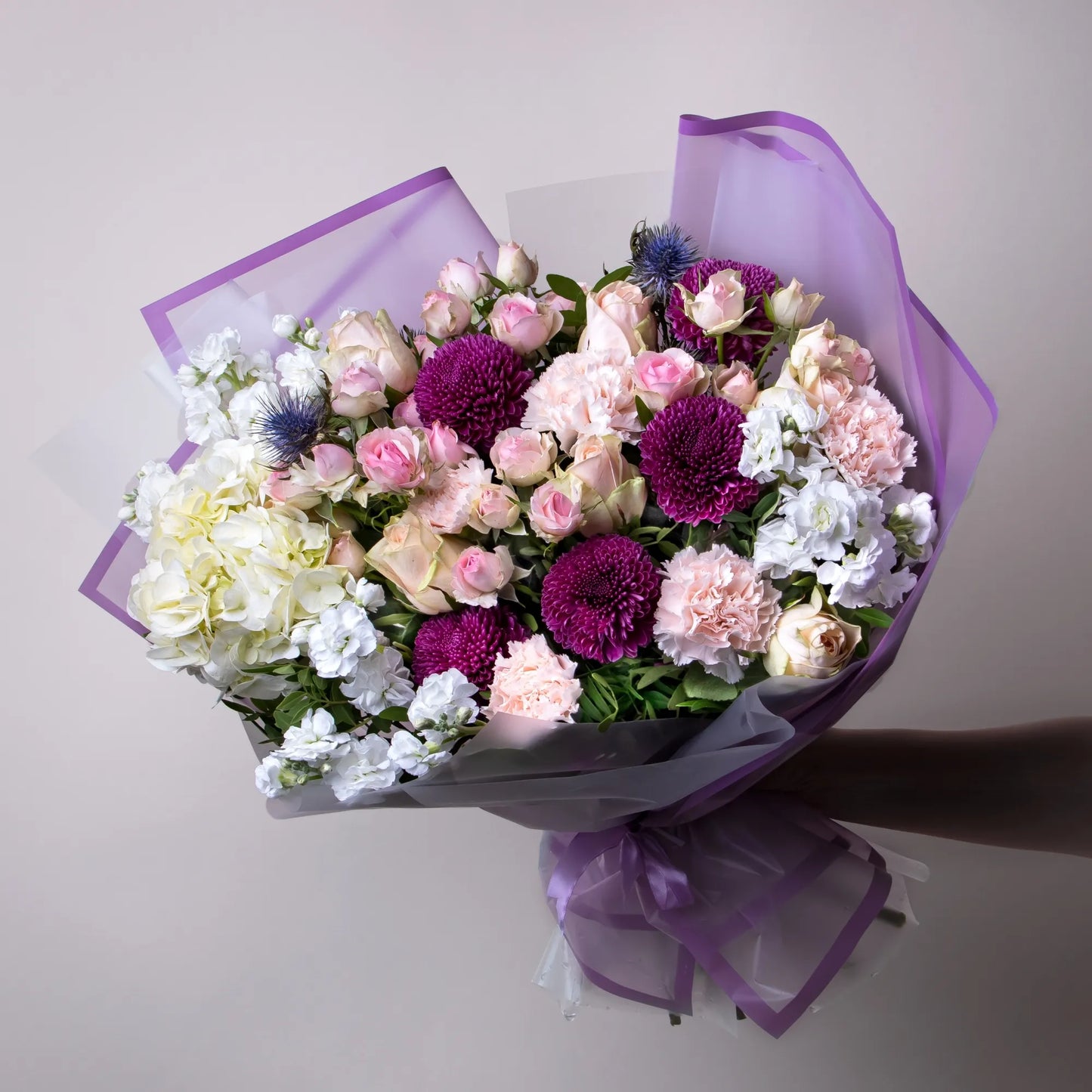 Mixed bouquet with roses, hydrangea, stock, and carnations