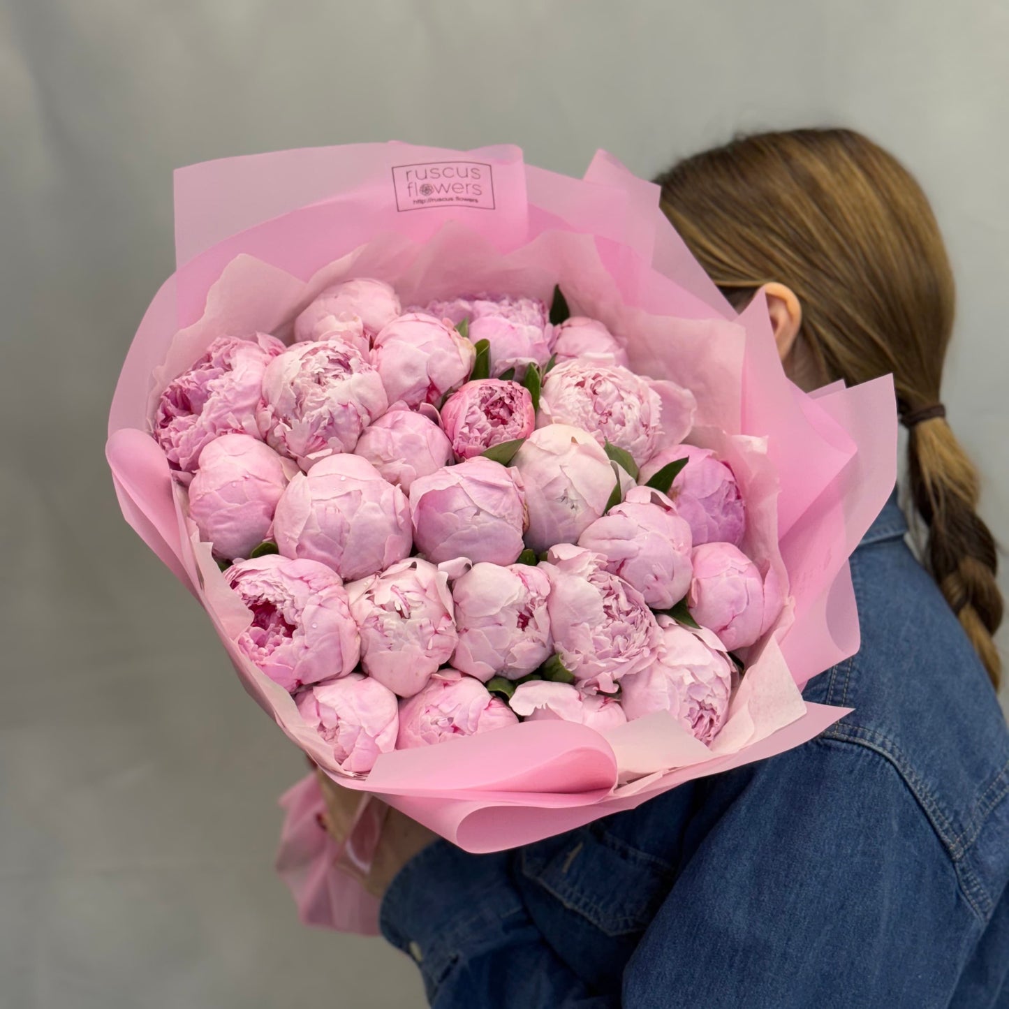 Soft pink peonies in light wrapping