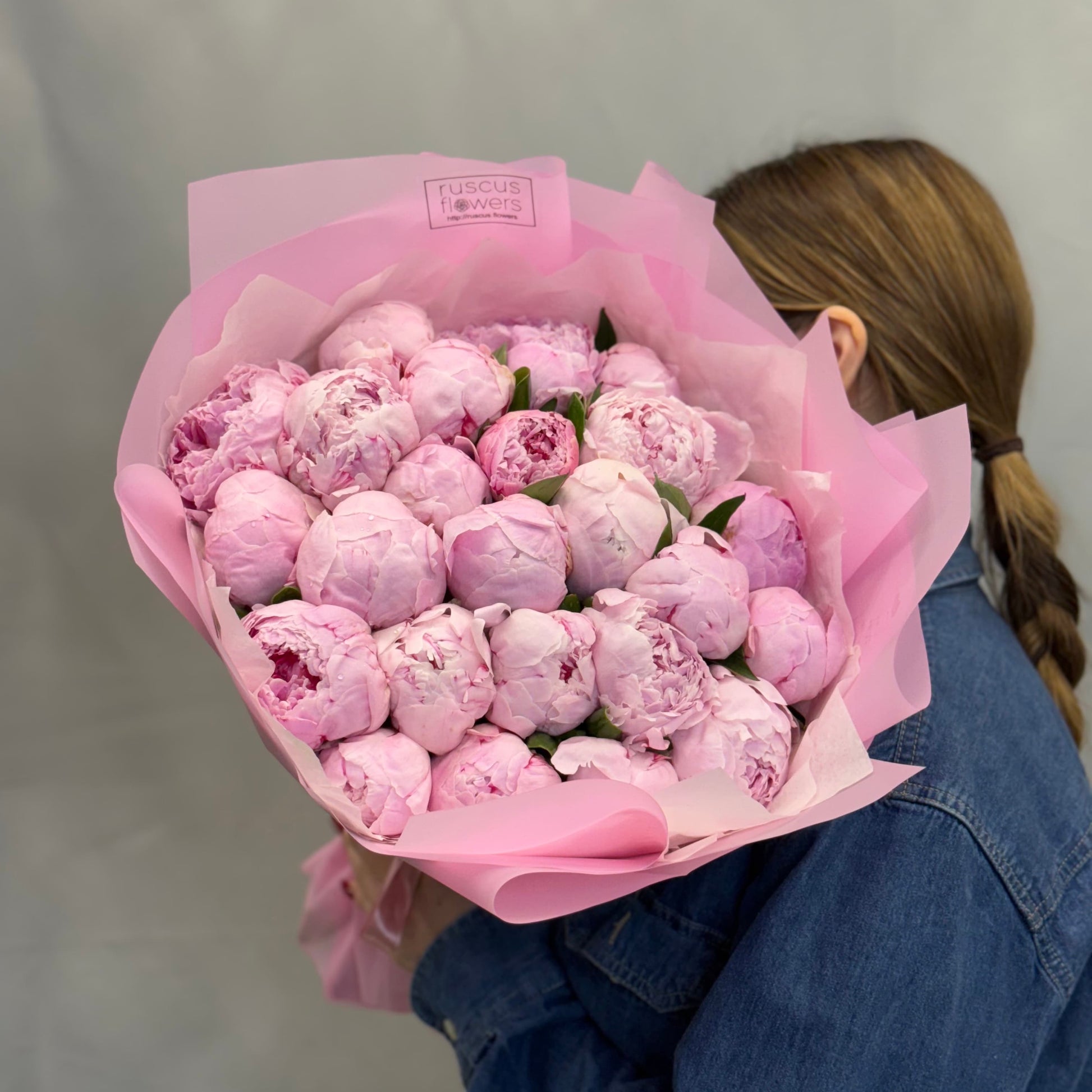 Soft pink peonies in light wrapping