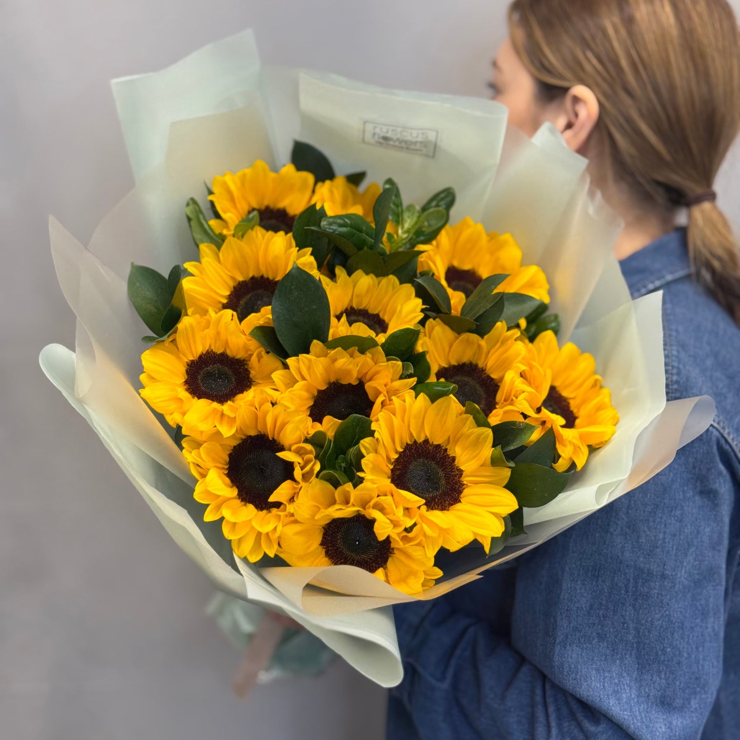 Yellow sunflowers with natural wrapping