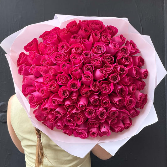 Hand-tied bouquet of 100 long-stem Pink Floyd roses.