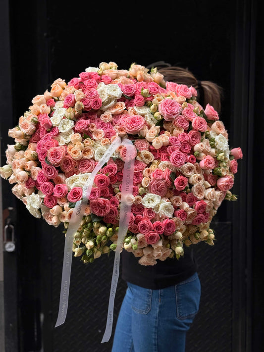 Large bouquet of soft blush spray roses
