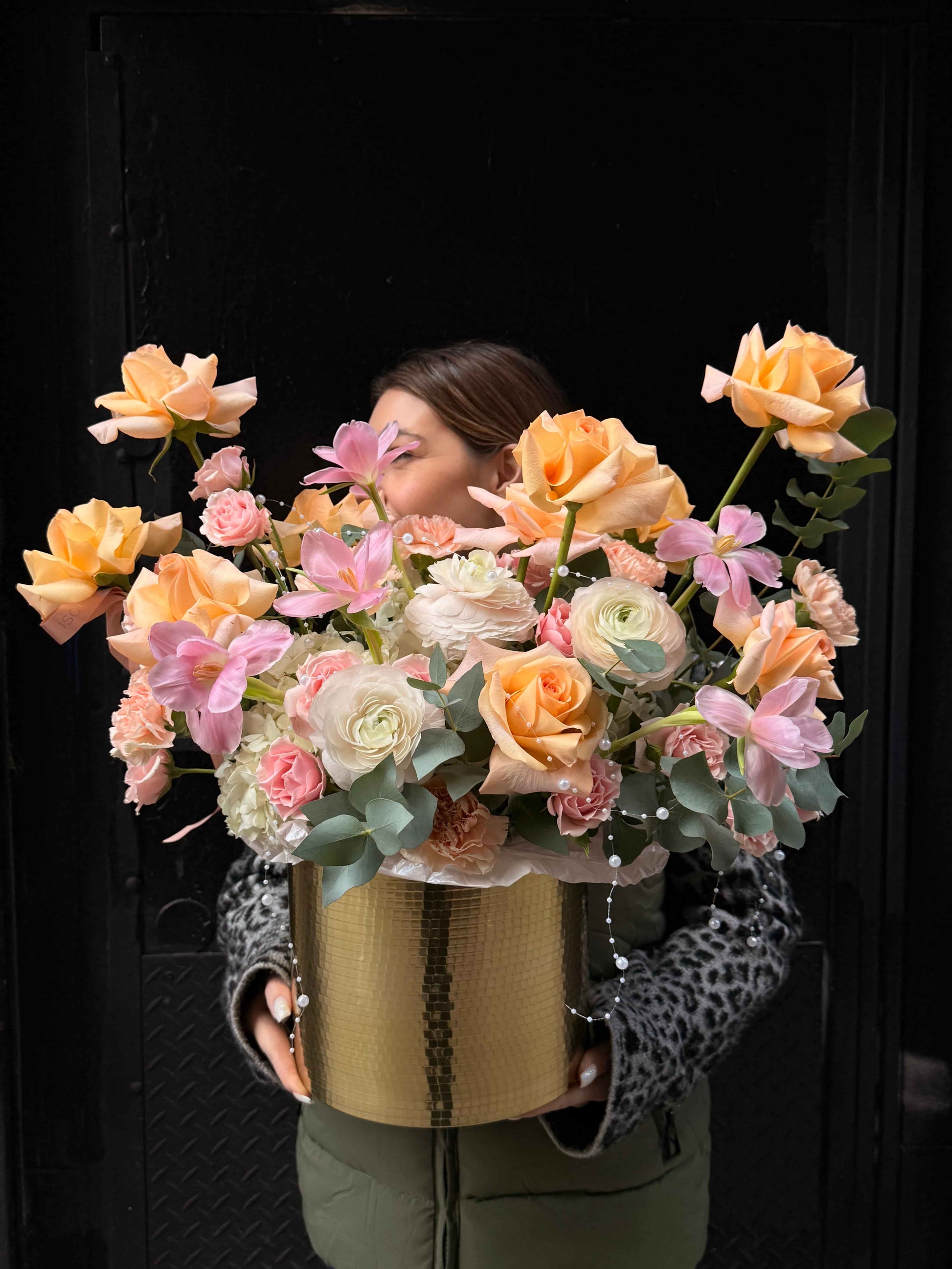 Artistic bouquet of assorted seasonal flowers