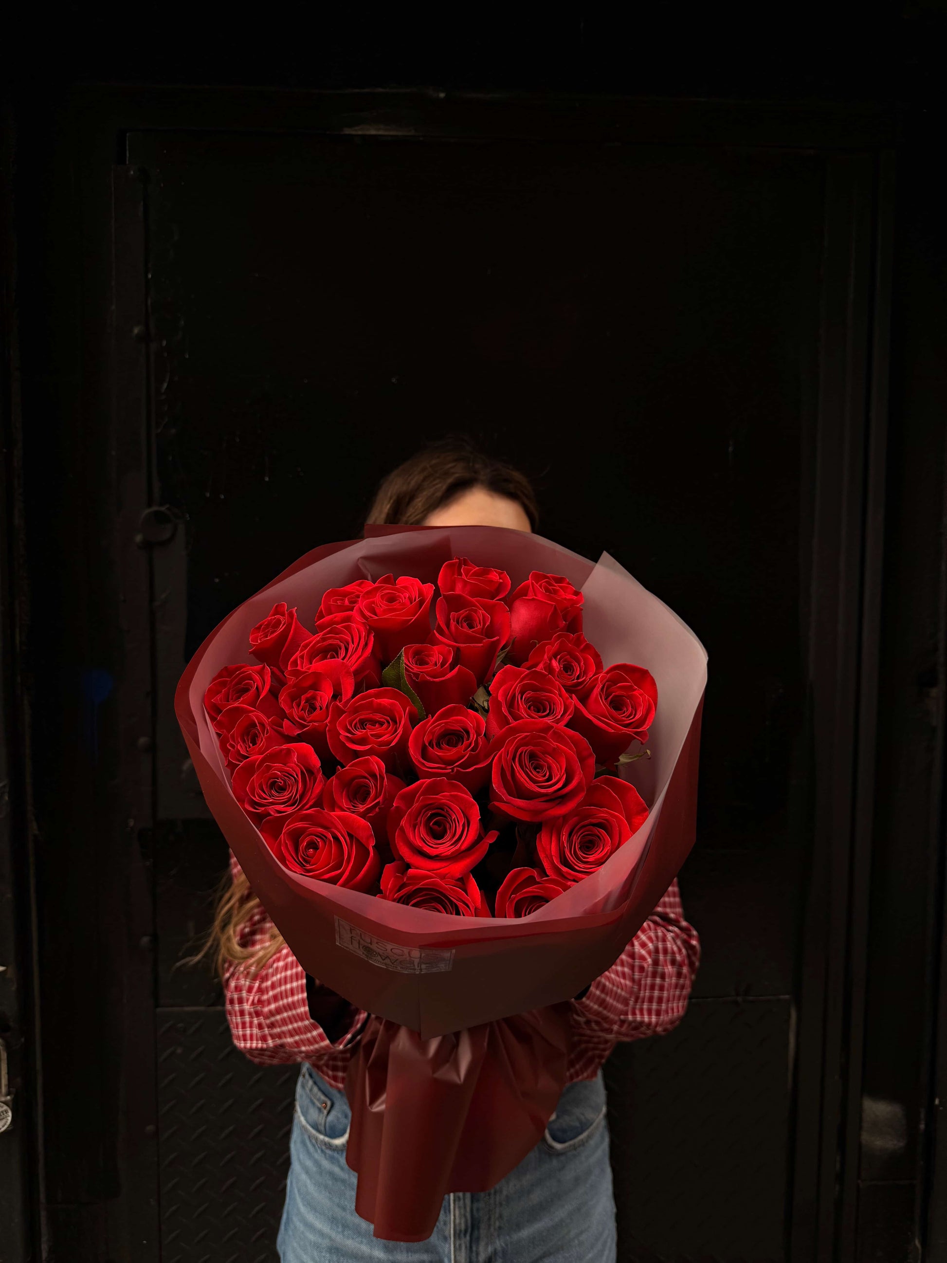Bouquet of 24 red roses in elegant wrapping