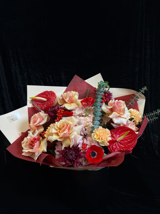 Colorful flower arrangement on a black background