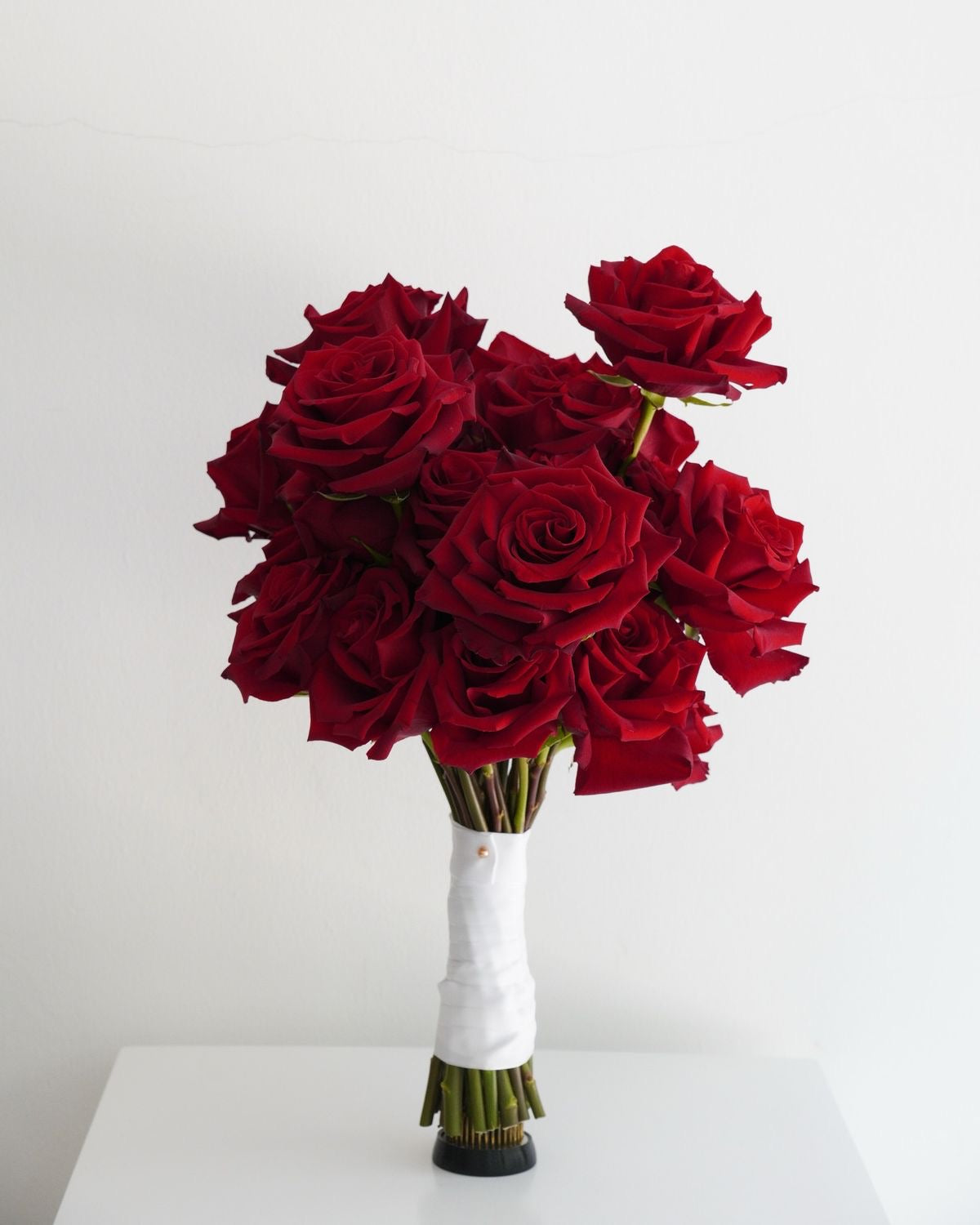 Bridal bouquet made of red roses.