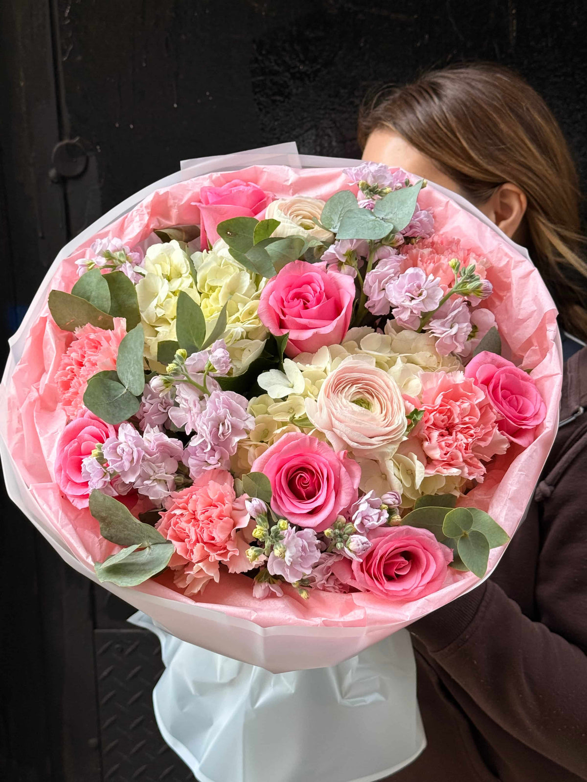 Bright bouquet with roses and hydrangeas