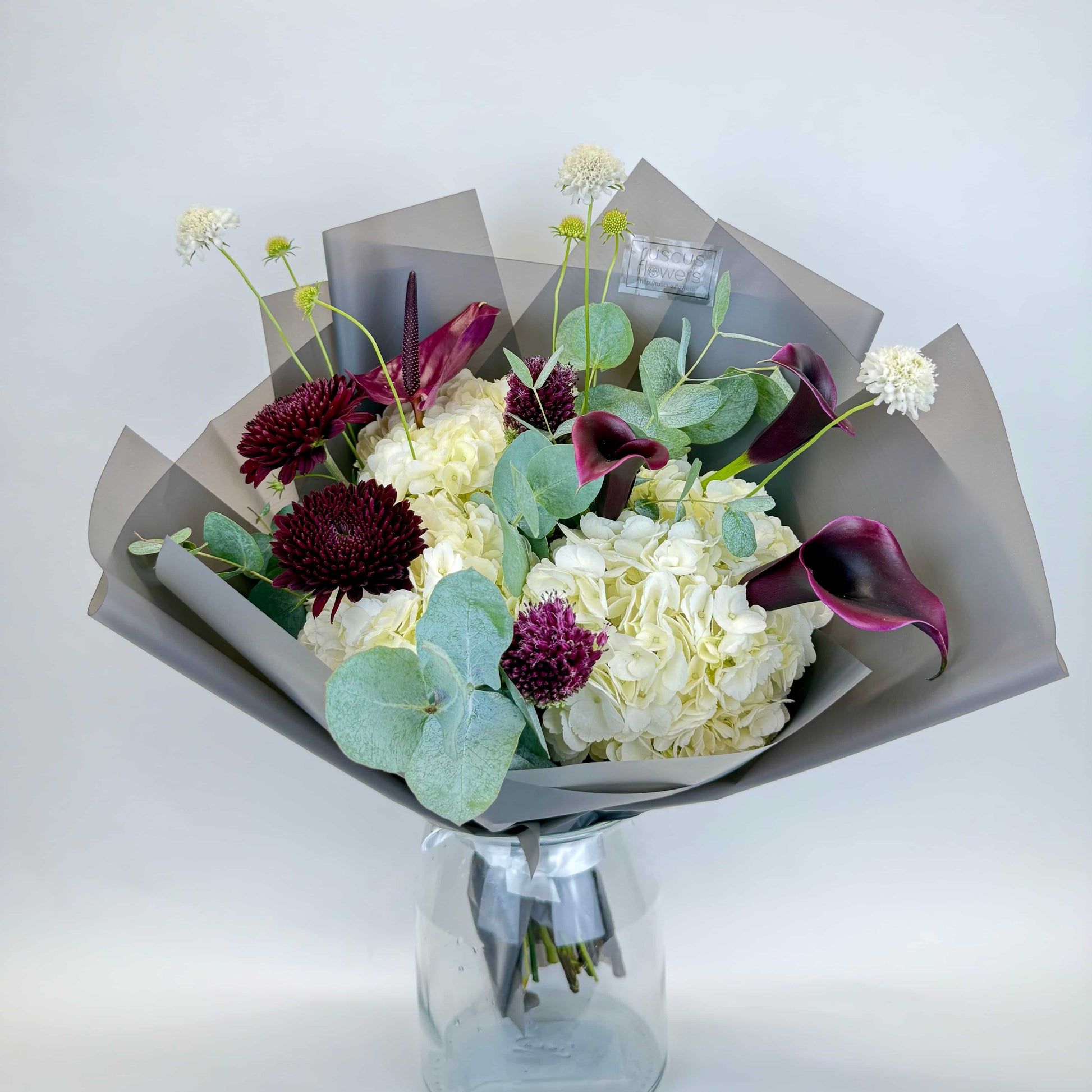 Designer bouquet with calla lilies, hydrangeas, anthurium