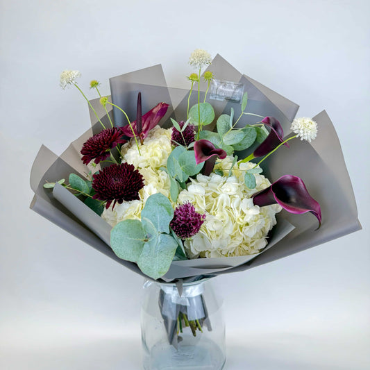 Designer bouquet with calla lilies, hydrangeas, anthurium
