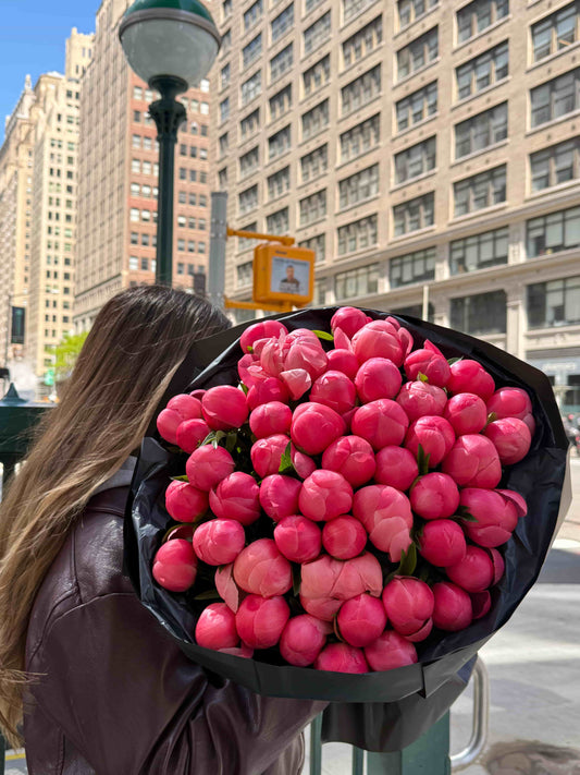 Large bouquet of Coral Charm peonies in bright coral tones