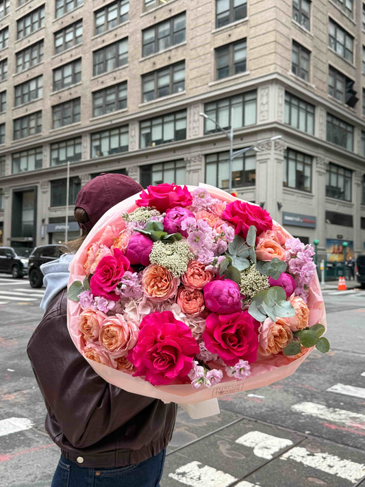 Bouquet with peonies, French roses and hydrangea in soft tones