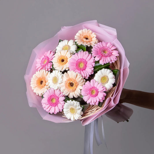 Bouquet of 14 mixed gerbera mini with aspidistra and pistachio leaves