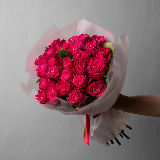 Bouquet of 24 hot pink roses with greenery