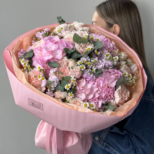 Mixed bouquet with hydrangea, chamomile, spray roses, carnations, and stock