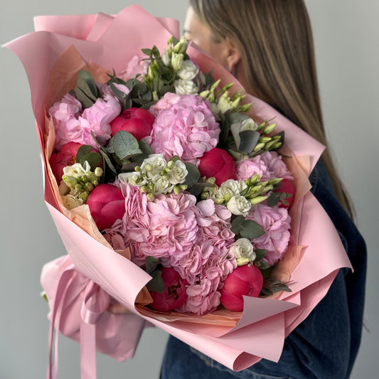 Bouquet with hydrangeas, peonies, lisianthus, and eucalyptus