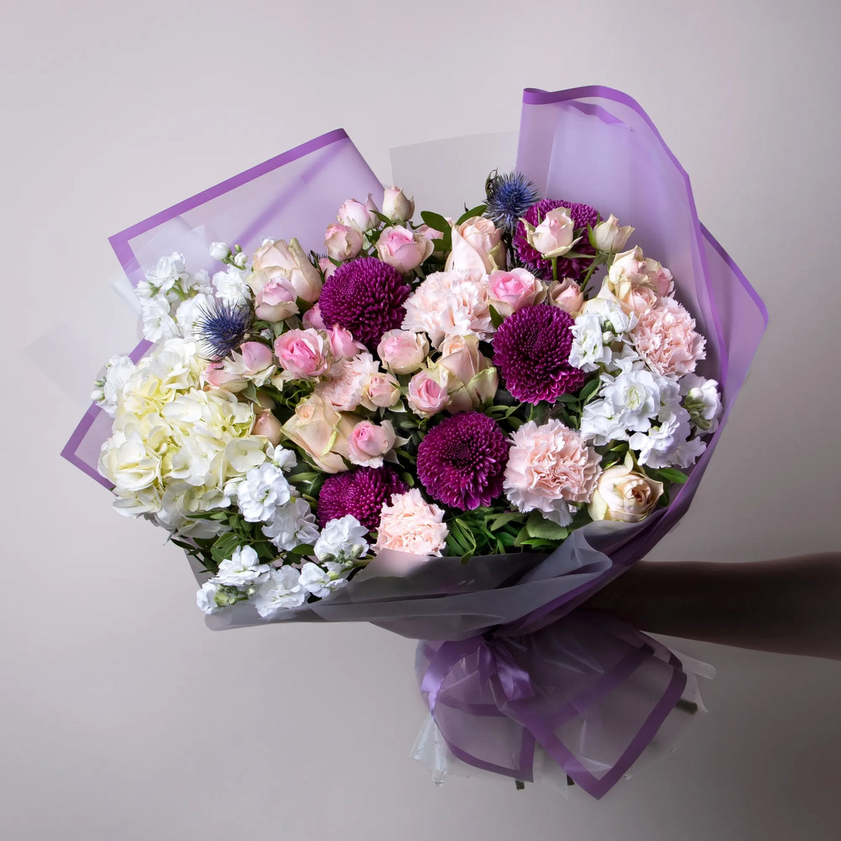 Mixed bouquet with roses, hydrangea, stock, and carnations
