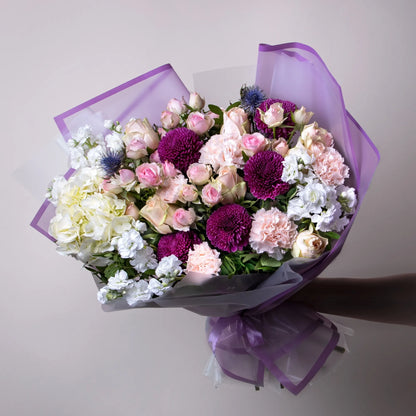 Mixed bouquet with roses, hydrangea, stock, and carnations