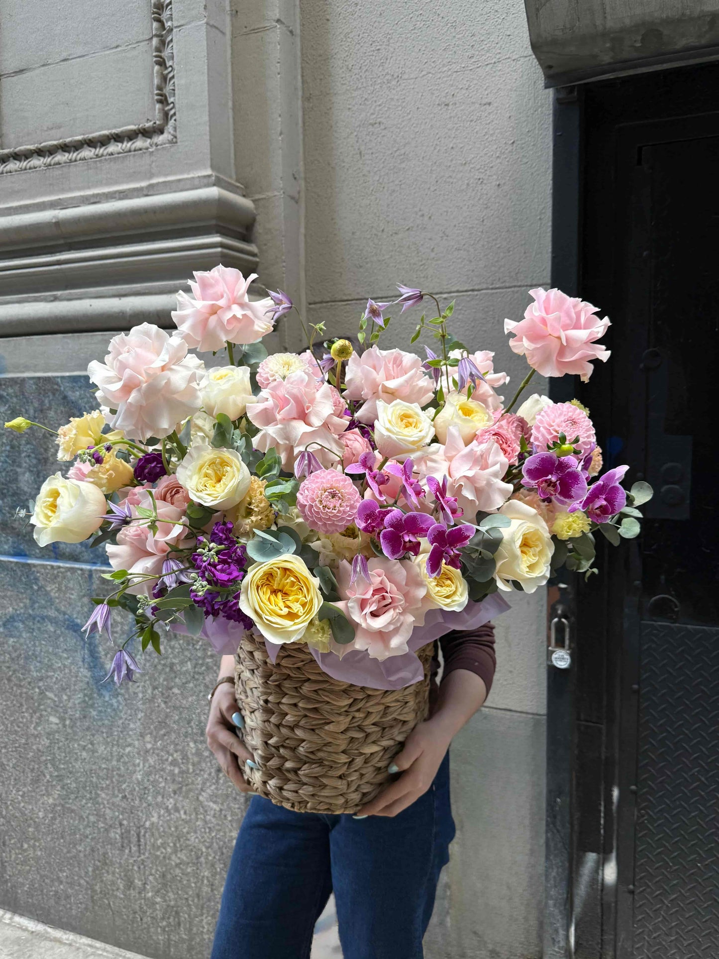 Luxury flower basket with orchids, French roses and hydrangeas