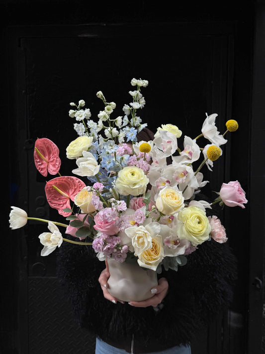 Luxury vase arrangement with orchids, anthurium and garden roses in NYC