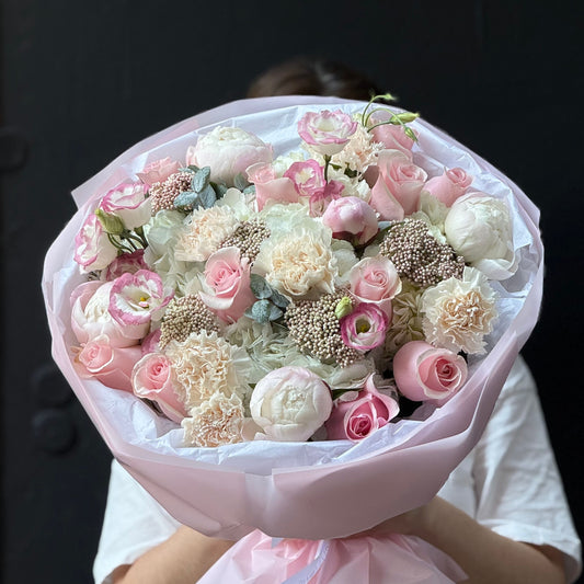 Large pink WOW bouquet with peonies, roses, hydrangea, lisianthus and ozothamnus.