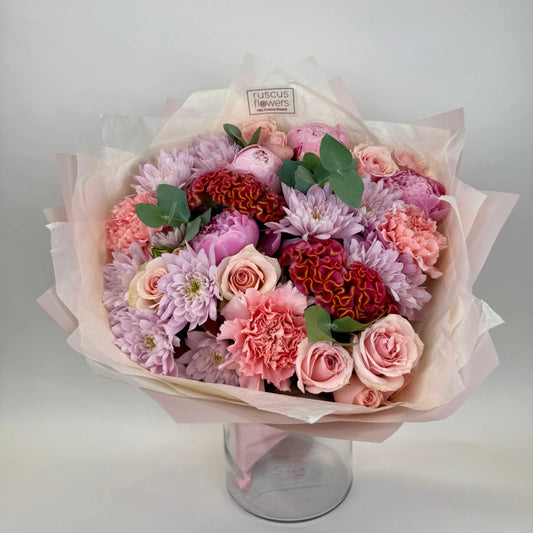 Bouquet with peonies, celosia, spray roses, carnations, and chrysanthemums
