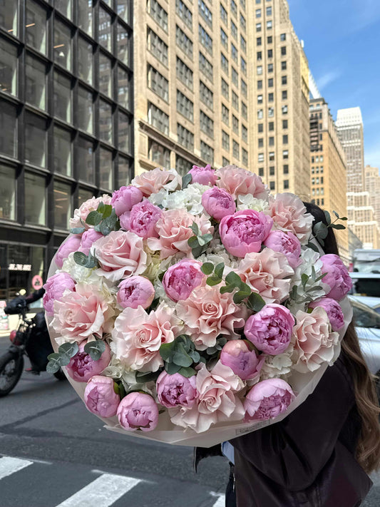Large pink bouquet with peonies, hydrangeas and French roses