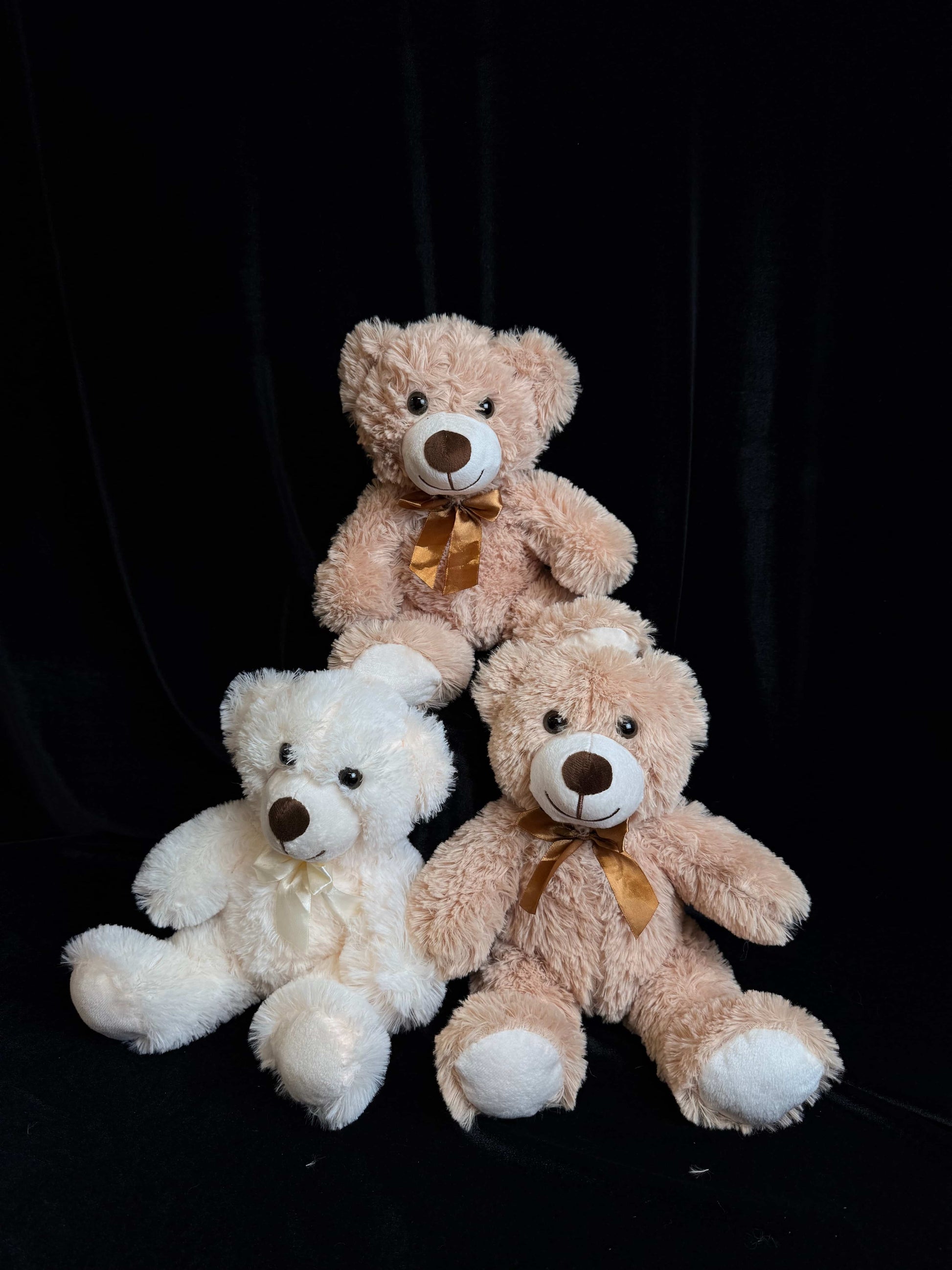 Plush teddy bear gift with flowers