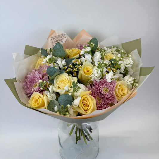 Mixed bouquet with roses, stock, spray chrysanthemums and tanacetum