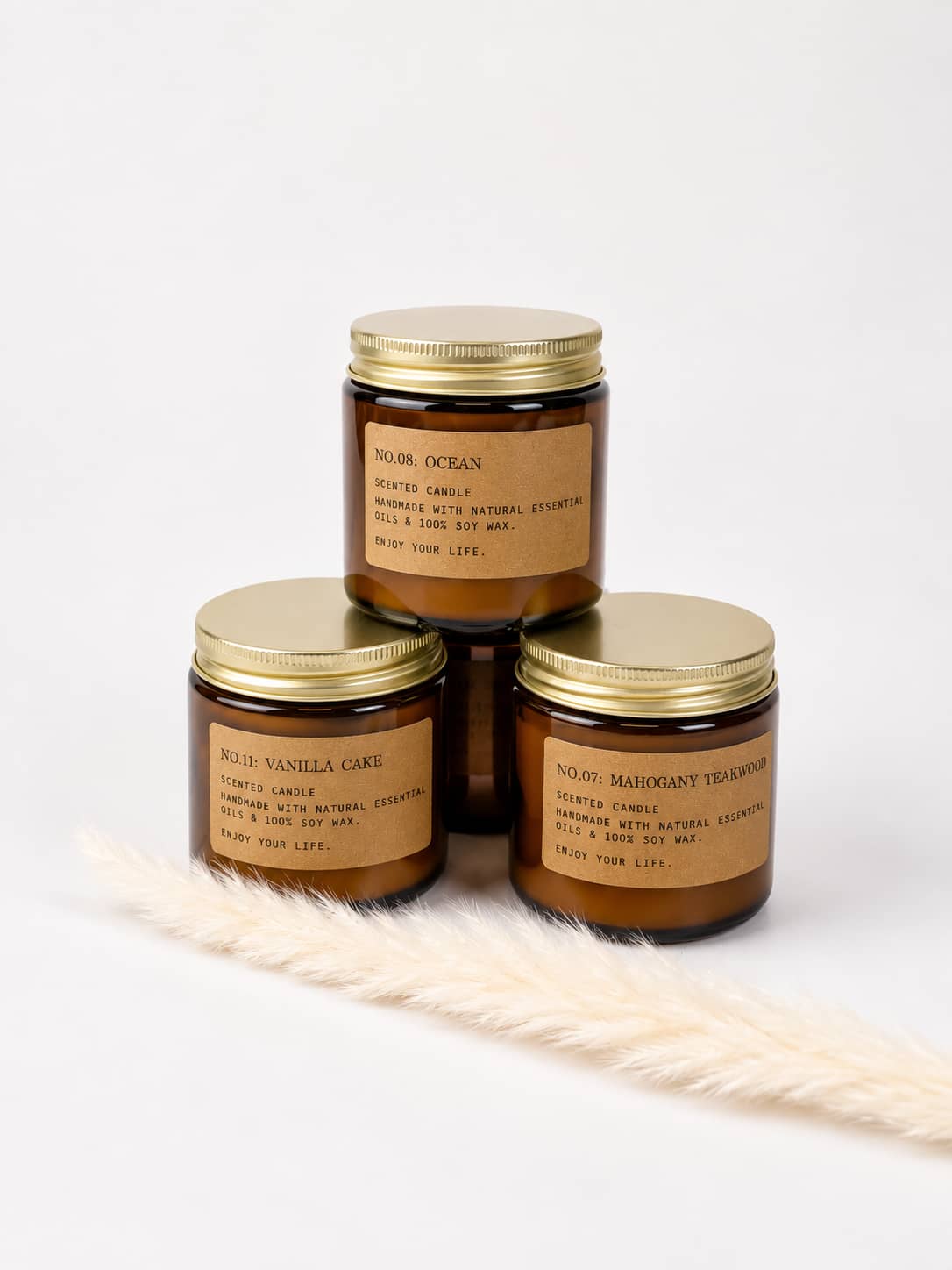 Small scented soy candles in amber glass jars