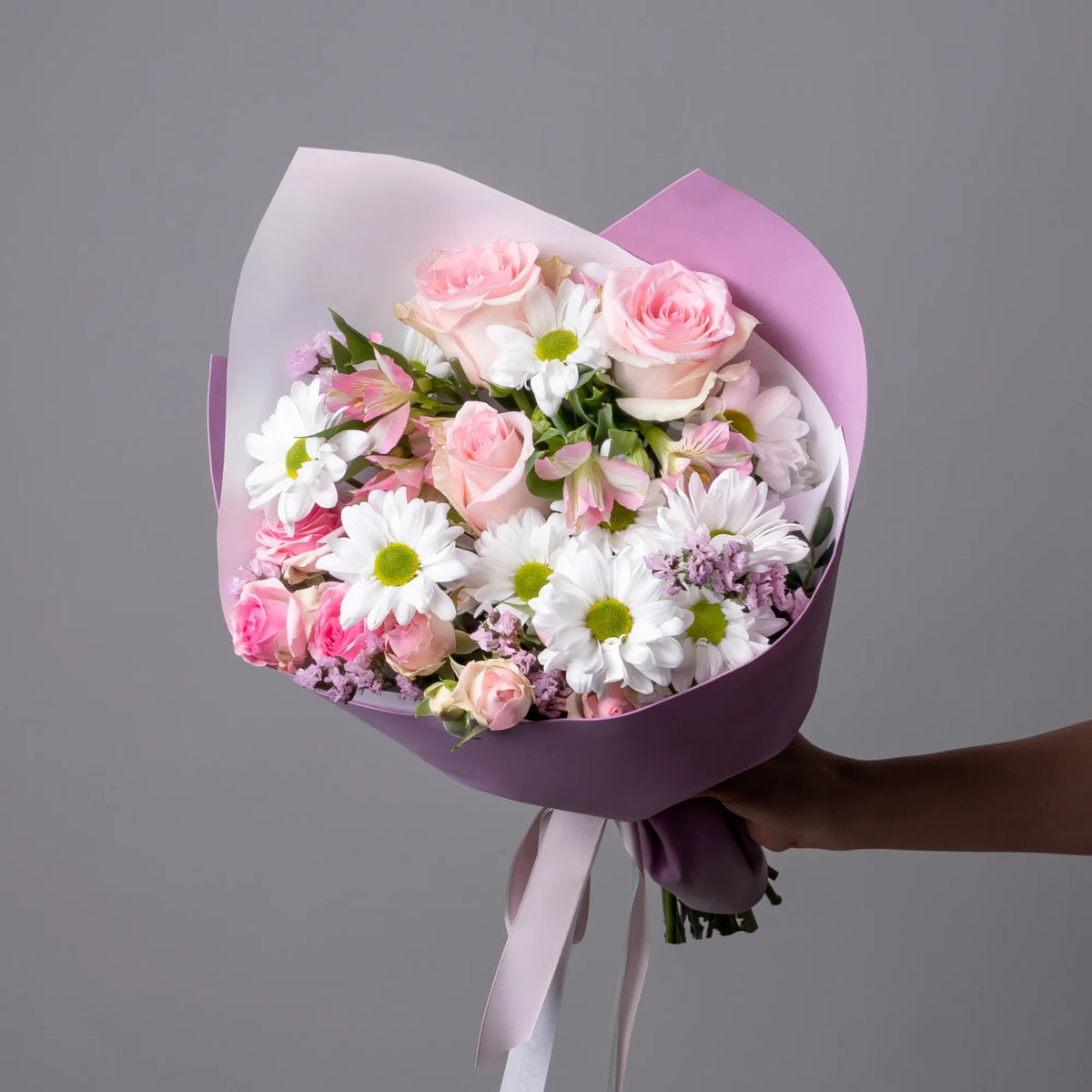 Soft bouquet with roses, alstroemeria, spray roses, and chrysanthemums