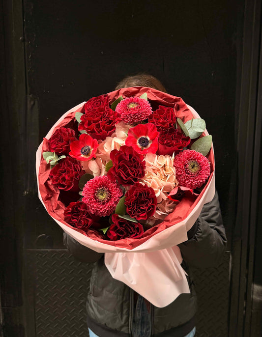 Soft bouquet of roses, hydrangeas, anemones and gerberas