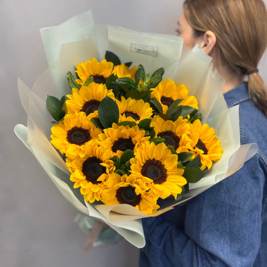 Yellow sunflowers with natural wrapping