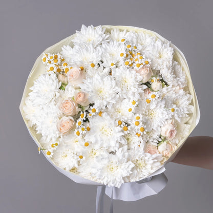 White bouquet with chamomile, spray roses, and chrysanthemums