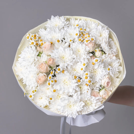 White bouquet with chamomile, spray roses, and chrysanthemums