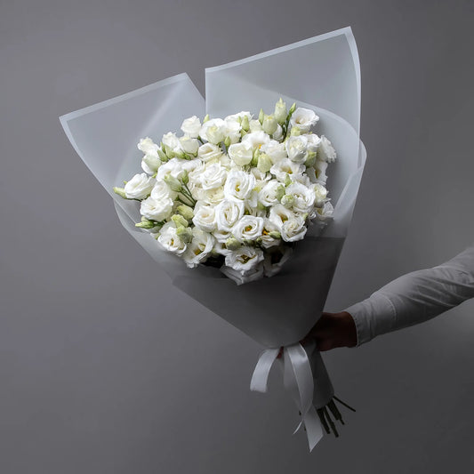 Bouquet of 12 white lisianthus with soft greenery